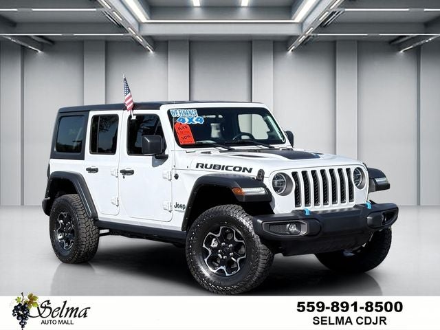 2021 Jeep Wrangler 4xe Unlimited Rubicon 4x4 in Bright White Clearcoat — front three-quarter view
