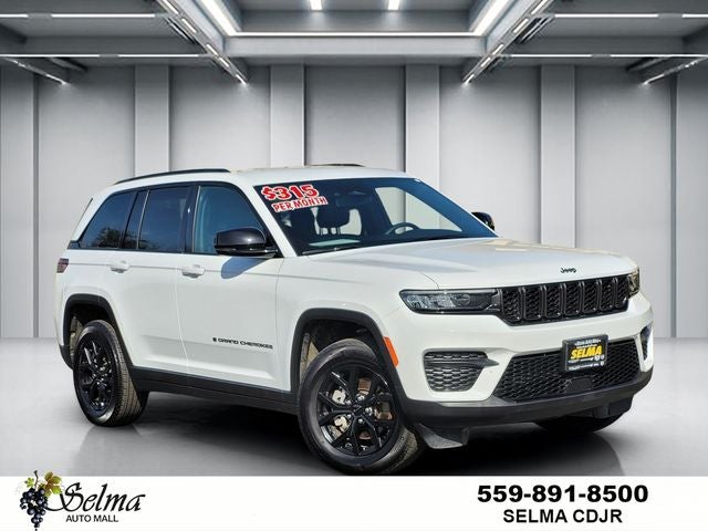 2024 Jeep Grand Cherokee Altitude 4x4 in Bright White Clearcoat — front three-quarter view