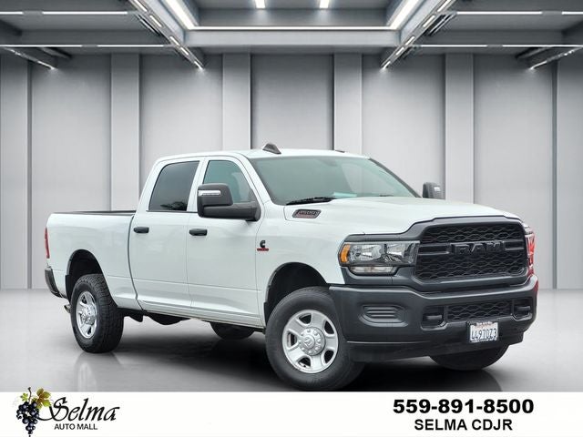 2024 RAM 3500 Tradesman Crew Cab 4x4 6'4' Box in Bright White Clearcoat — front three-quarter view