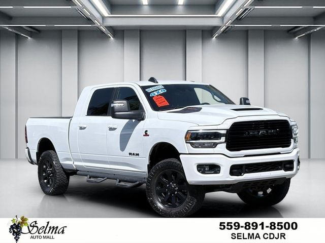 2024 RAM 2500 Laramie Crew Cab 4x4 6'4' Box in Bright White Clearcoat — front three-quarter view