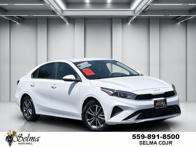 2023 Kia Forte LXS in Snow White Pearl — front three-quarter view
