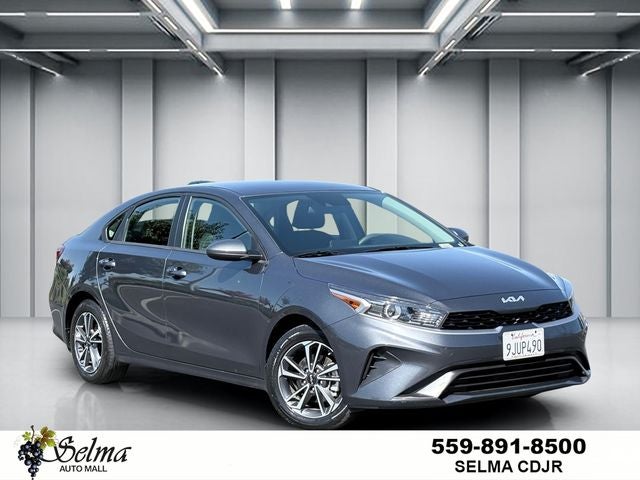 2024 Kia Forte LXS in Gravity Gray — front three-quarter view