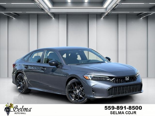 2025 Honda Civic Sport in Blue — front three-quarter view